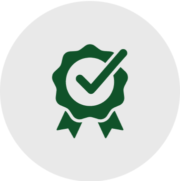 A green and white icon of a seal with a check mark.